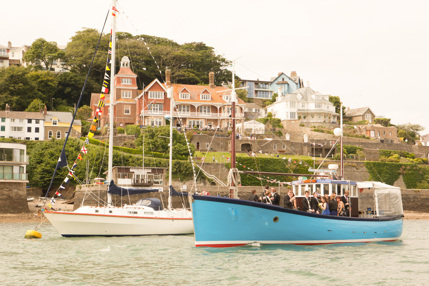 Cliff House viewed from the water with boats in the foreground