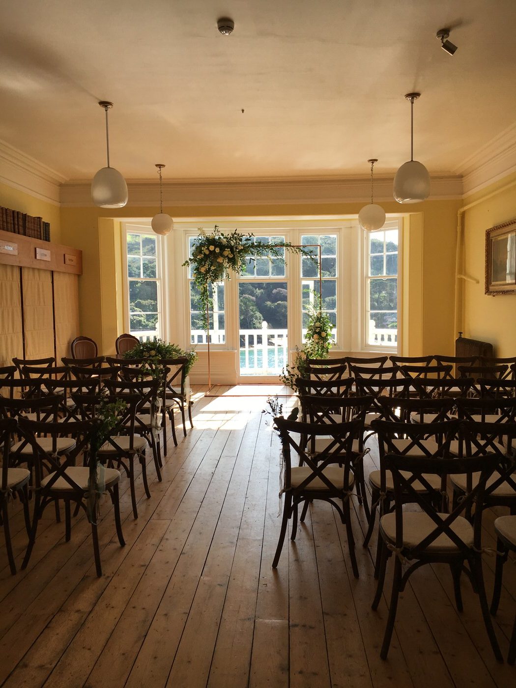 The library room at Cliff House looking out towards the water
