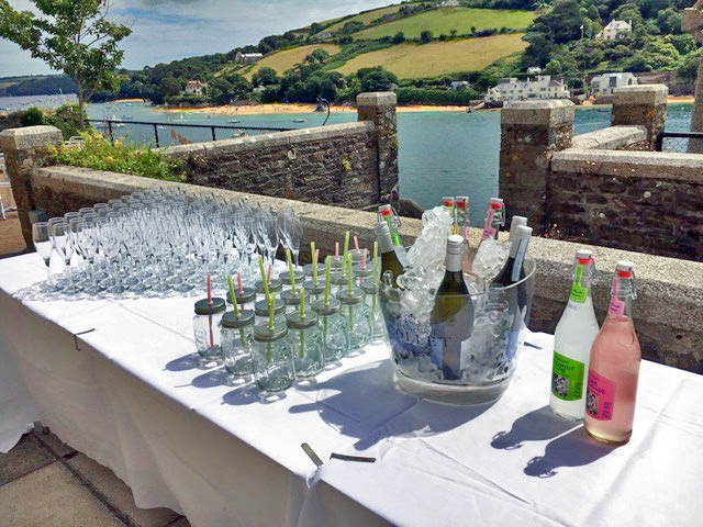 Cliff House terrace set up with refreshments and a view over the estuary